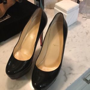 Bianca louboutin platform pumps.